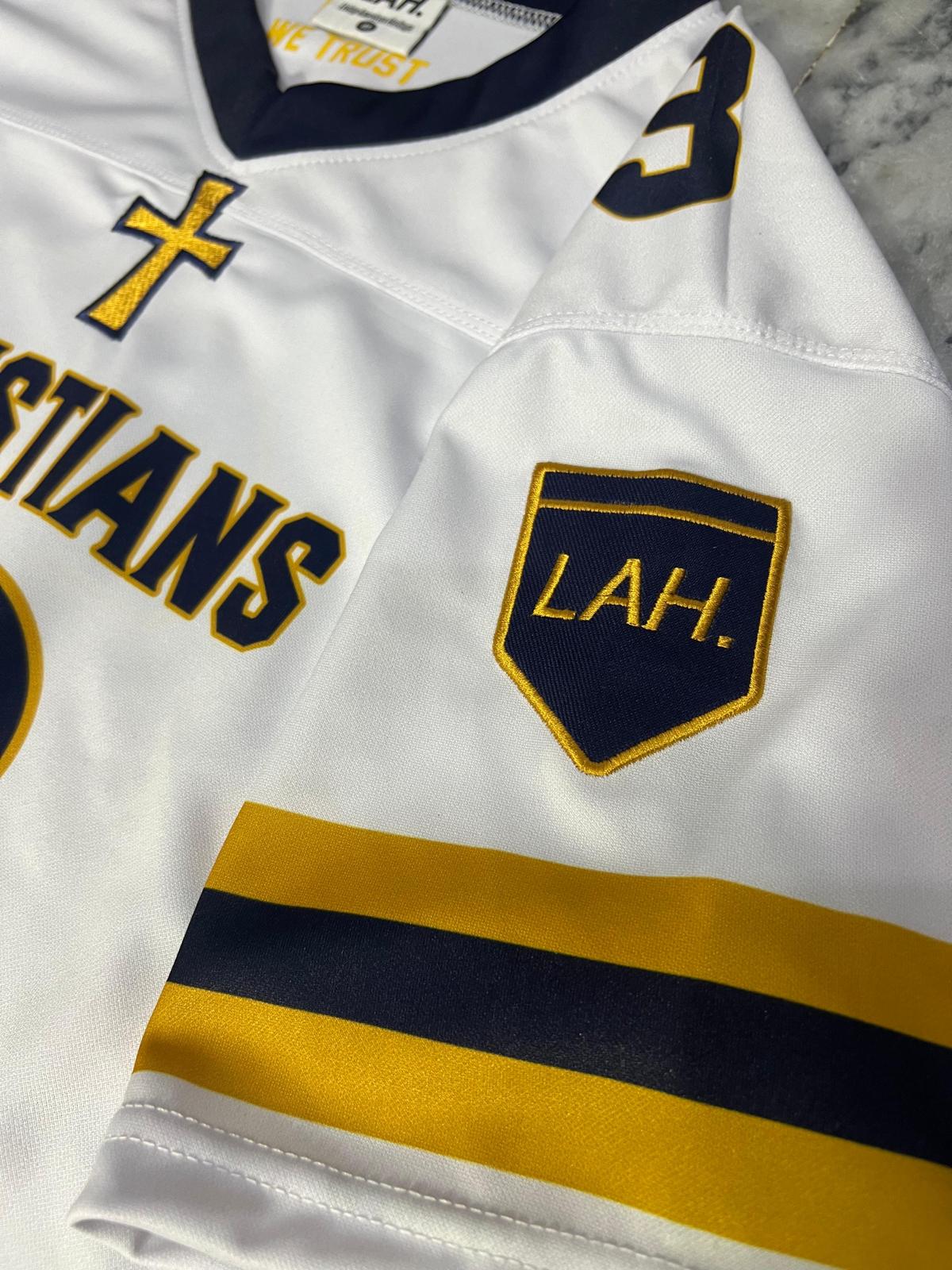 White sports jersey with yellow and blue accents, featuring 'LAH.' logo and text.