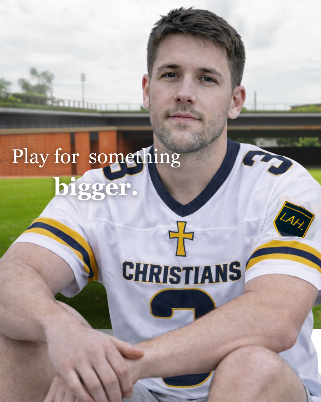 Man in a sports jersey with 'Play for something bigger.' text on a sports field.